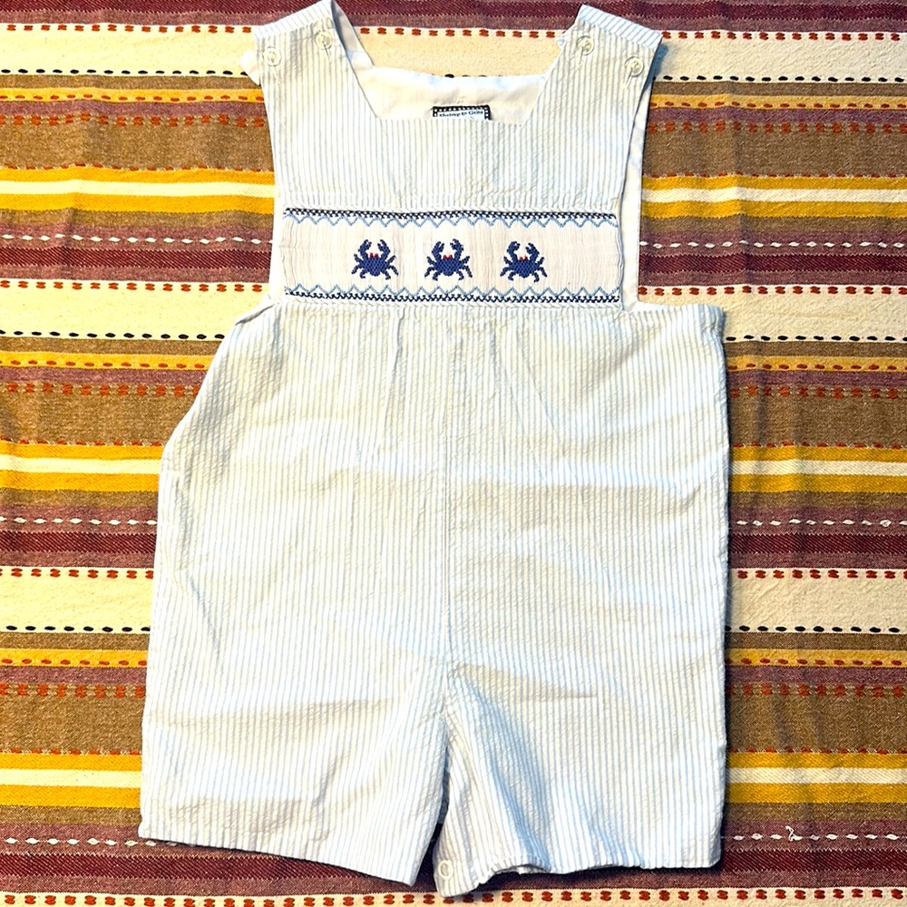 Boys seersucker smocked crab shortall.